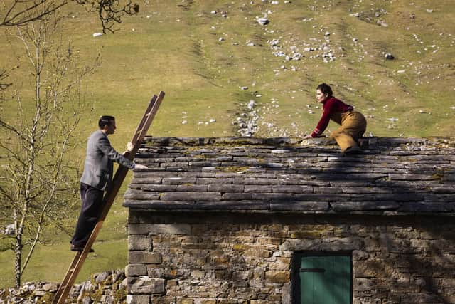 Helen Alderson (Rachel Shenton) and James Herriot (Nicholas Ralph) in a key scene from Season 2 of All Creatures Great and Small - at Helen's family farm, which is filmed in Yockenthwaite.