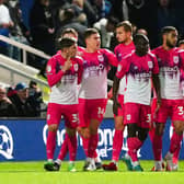 Huddersfield Town's Josh Ruffels (second left) celebrates scoring their side's first goal of the game during the Sky Bet Championship match at Loftus Road, London. Picture: Zac Goodwin/PA Wire.