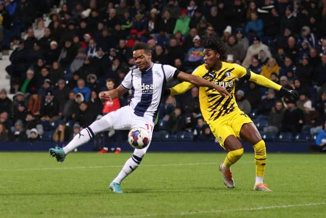 WEST BROMWICH, ENGLAND - DECEMBER 17: Grady Diangan of West Bromwich scores their second goal during the Sky Bet Championship between West Bromwich Albion and Rotherham United at The Hawthorns on December 17, 2022 in West Bromwich, England. (Photo by Nathan Stirk/Getty Images)