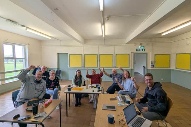 Members of the Rose Garden Cafe Partnership celebrate the news that Sheffield City Council has granted planning permission for restoration work and extensions to the building in Graves Park. Picture: Rose Garden Cafe Partnership