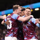 BURNLEY, ENGLAND - APRIL 10: Johann Berg Gudmundsson of Burnley celebrates with Ashley Barnes after scoring the opening goal during the Sky Bet Championship between Burnley and Sheffield United at Turf Moor on April 10, 2023 in Burnley, England. (Photo by Alex Livesey/Getty Images)