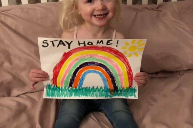 Adorable Ryanna, aged two, looked really pleased with the rainbow she has drawn