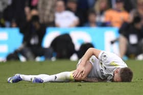 Leeds United's Stuart Dallas has been out of action for nearly two years. Image: OLI SCARFF/AFP via Getty Images
