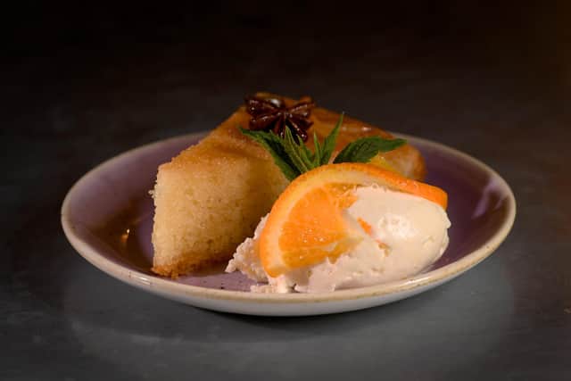 Orange and lemon cake vanilla ice cream with raisins soaked in Pedro Ximinez. Picture: Simon Hulme.  ,