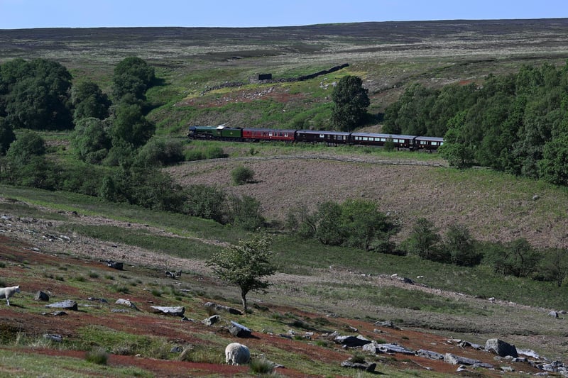 The Flying Scotsman hauls the Royal Train across the moors