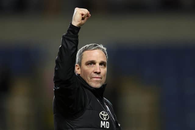 Michael Duff, Manager of Barnsley, celebrates following the team's victory at Oxford (Picture: Richard Heathcote/Getty Images)