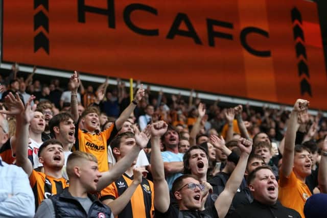 HULL, ENGLAND - JULY 30: Fans of Hull City chant during the Sky Bet Championship match between Hull City and Bristol City at MKM Stadium on July 30, 2022 in Hull, England. (Photo by Ashley Allen/Getty Images)