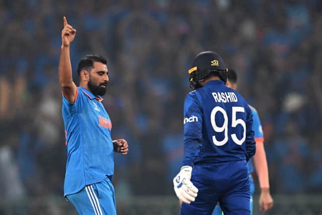Mohammed Shami wheels away after taking the wicket of Adil Rashid on his way to India's best figures of 4-22. Photo by Sajjad Hussain/AFP via Getty Images.