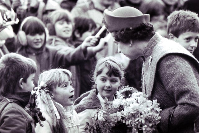 The Queen meets school children at the Brampton Centre in South Yorkshire on 12th December 1986.