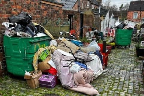 Piles of rubbish and flytipping in the back alley in North Ormesby