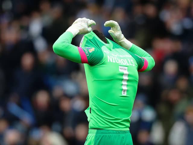 Huddersfield Town's Lee Nicholls looks dejected following the Sky Bet Championship match against Birmingham City at the John Smith's Stadium, which all but confirms relegation for the Terriers. Picture: Jess Hornby/PA Wire.