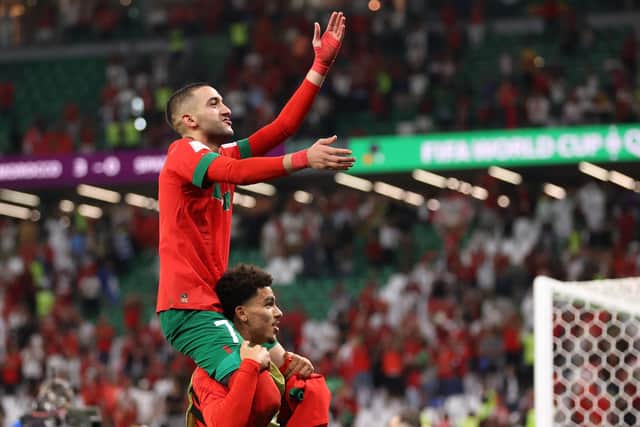 Hakim Ziyech of Morocco celebrates victory following the FIFA World Cup Qatar 2022 Round of 16 match between Morocco and Spain (Picture: Catherine Ivill/Getty Images)