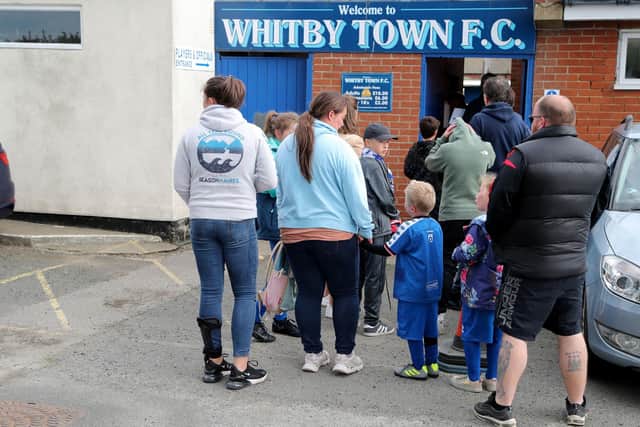 Football fans arrive at Whitby Town's ground (Picture: Richard Sellers/PA Wire)