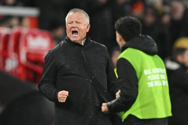 UP AND RUNNING: Sheffield United manager Chris Wilder celebrates James McAtee's opening goal