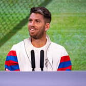 Cameron Norrie of Great Britain speaks to the media in a pre-tournament press conference in the Media Theatre in the Broadcast Centre at The Championships 2023, at The All England Lawn Tennis Club in Wimbledon (Picture: AELTC/Florian Eisele/Handout via Getty Images)