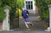 Mayor of Greater Manchester Andy Burnham outside his house in Warrington, Cheshire. PIC: Peter Byrne/PA Wire