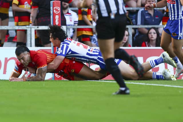 Nick Cotric goes over to score against St Helens. (Photo: Paul Currie/SWpix.com)