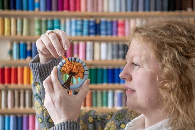 Dorset Button maker Gini Armitage working in her home studio, who has revived the tradition,  photographed for The Yorkshire Post Magazine by Tony Johnson.