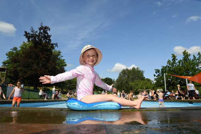 Pictured 5 year old Beatrice Cooper enjoys the paddling pool in Valley Gardens, Harrogate, in 2024 Picture Gerard Binks