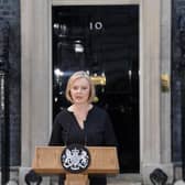 Prime Minister Liz Truss reads a statement outside 10 Downing Street. PIC: Dominic Lipinski/PA Wire
