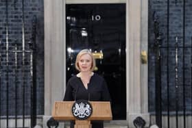 Prime Minister Liz Truss reads a statement outside 10 Downing Street. PIC: Dominic Lipinski/PA Wire
