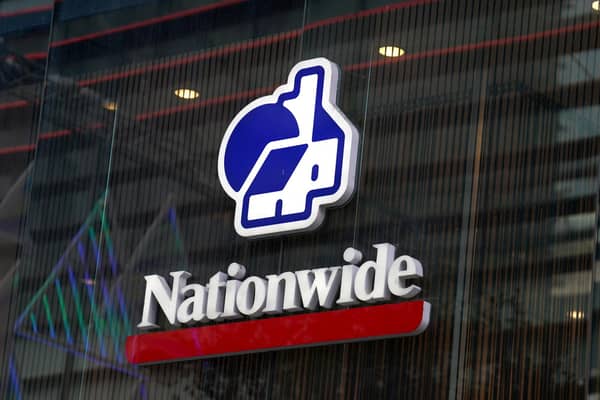 Nationwide Building Society has revealed lower earnings over the past year but said it handed out a record amount of cash to its members. (Photo Mike Egerton/PA Wire)