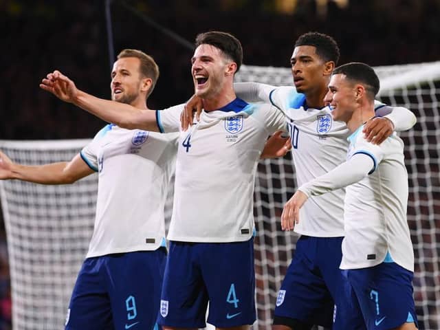 GLASGOW, SCOTLAND - SEPTEMBER 12: Jude Bellingham of England (2R) celebrates with teammates Harry Kane, Declan Rice and Phil Foden after scoring the team's second goal during the 150th Anniversary Heritage Match between Scotland and England at Hampden Park on September 12, 2023 in Glasgow, Scotland. (Photo by Stu Forster/Getty Images)