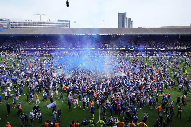 PARTY TIME: Ipswich Town celebrates their side’s promotion to the Premier League at Portman Road. Picture: Zac Goodwin/PA