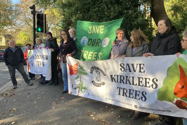 Protesters on the Blacker Road junction in Edgerton celebrate the announcement that plans for the A629 which would see the removal of 88 trees have been paused. Image taken by Abigail Marlow. Available for use across all LDRS partners.