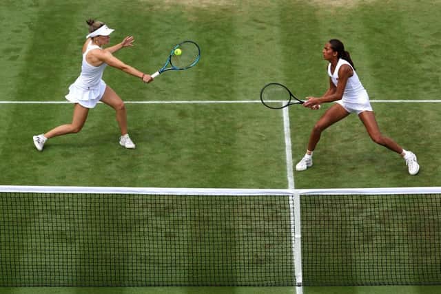 LONDON, ENGLAND - JULY 10: Naiktha Bains (R) of Great Britain and Maia Lumsden of Great Britain compete against Viktoria Hruncakova of Slovakia and Tereza Mihalikova of Slovakia in the Women's Doubles Second Round match during day eight of The Championships Wimbledon 2023 at All England Lawn Tennis and Croquet Club on July 10, 2023 in London, England. (Photo by Patrick Smith/Getty Images)