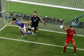 HIGH POINT:  Ao Tanaka wheels away after scoring Japan's controversial second goal in their 201 win World Cup over Spain in Doha
