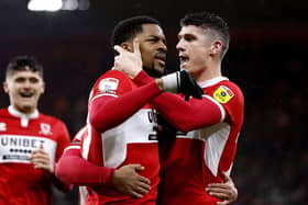 Five-star: Middlesbrough's Chuba Akpom celebrates with his team-mates after scoring their side's fifth goal in the rout of Norwich (Picture: Richard Sellers/PA)