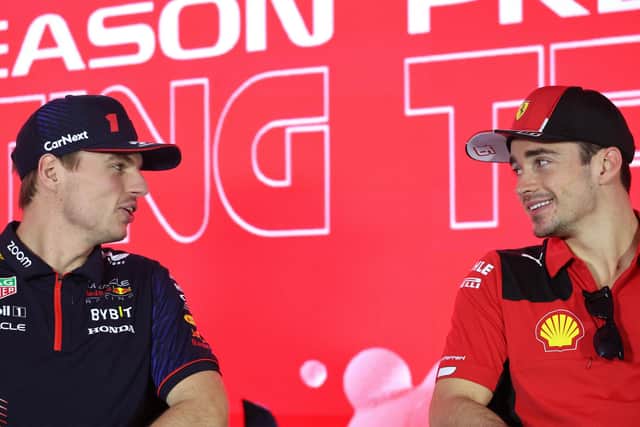 Red Bull's Dutch driver Max Verstappen (L) and Ferrari's Monegasque driver Charles Leclerc attend a press conference during the third day of Formula One pre-season testing at the Bahrain International Circuit in Sakhir, on February 25, 2023. (Photo by GIUSEPPE CACACE/AFP via Getty Images)