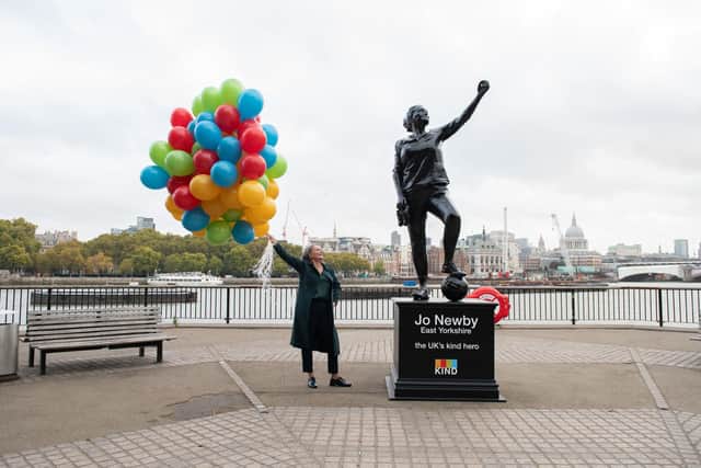 52-year-old foster carer Jo Newby at the unveiling of a statue in central London, which was created in her honour. (Pic: Tony Kershaw/KIND/PA Wire)