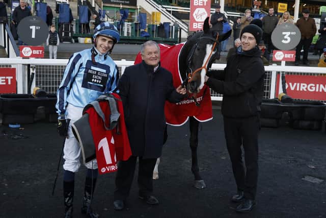 Victory: Jockey Ben Robinson (left) and trainer Brian Ellison, centre, with Onesmoothoperator after they won the Virgin Bet November Handicap.
Picture: Richard Sellers/PA Wire.