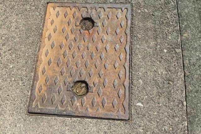 The claimant said they had fallen over a manhole cover
