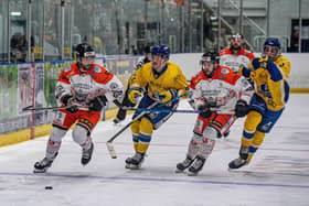 The chase is on: Sheffield Steeldogs' Ben Morgan, left, leads a team-mate and two Leeds Knights players in Sunday's game. (Picture: Tony Johnson)
