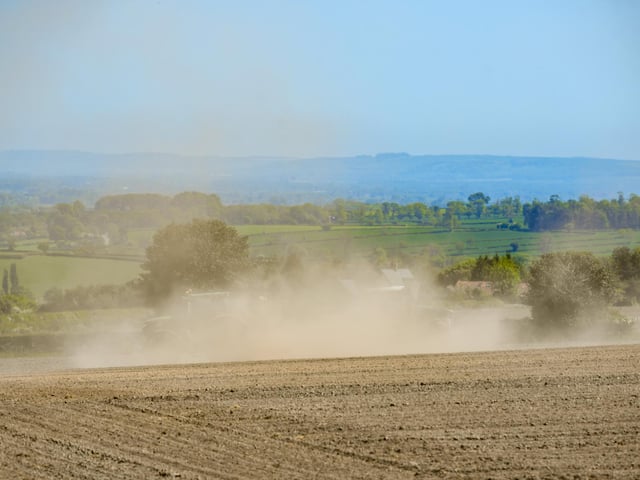 Farmers drive their tractors through a dry and dusty field as drought conditions continue to worsen across parts of the UK this spring. This image, taken near Helmsley, North Yorkshire, during an extended spell of below-average rainfall, shows the impact of the dry weather on farmland. Picture: James Hardisty.