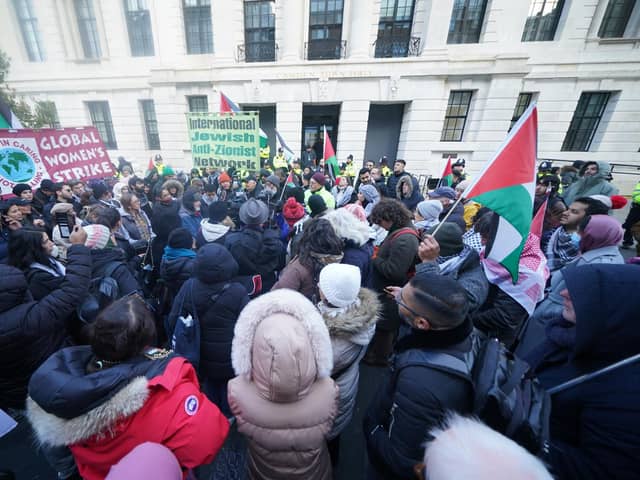 People take part in a Day of Action for Palestine, organised by the Palestine Solidarity Campaign, outside Camden Town Hall in London. PIC: Yui Mok/PA Wire