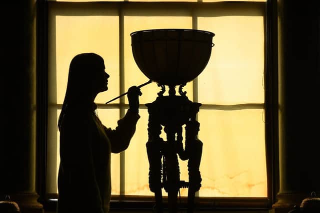 Spring clean at Harewood House, Leeds. Niamh Kelly is pictured cleaning one of the Touchere on display in the Gallery at the House. Picture taken by Yorkshire Post Photographer Simon Hulme