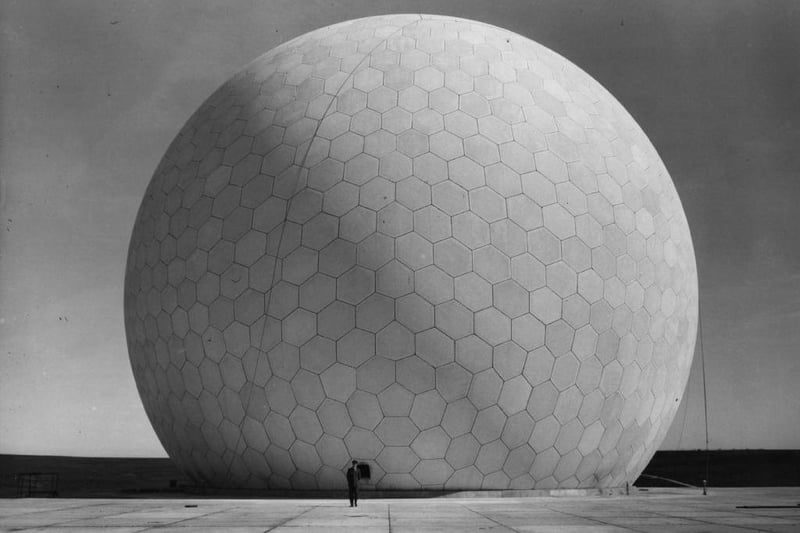 Fylingdales, the ballistic missile early warning station in Yorkshire, which consists of a 140ft diameter 'Radome' radar. An RAF officer stands at its base.