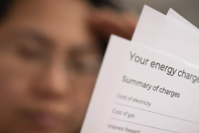 A person holding an energy bill. PIC: Danny Lawson/PA Wire