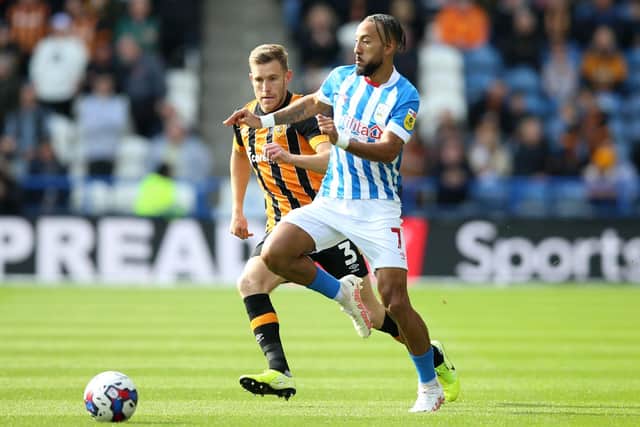 Huddersfield Town's Sorba Thomas (right) and Hull City's Callum Elder during the Sky Bet Championship match at The John Smith's Stadium (Picture: PA)