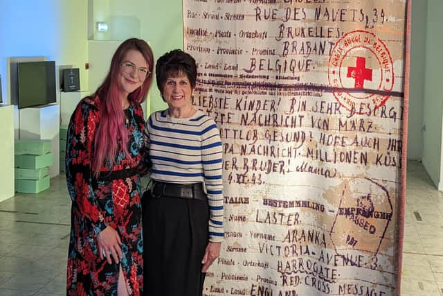 Artist Laura Fisher with Michelle Green and the blanket. Picture: Holocaust Centre North