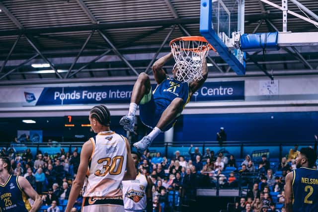 Marcus Delpeche makes a dunk for the Sheffield Sharks (Picture: Adam Bates)