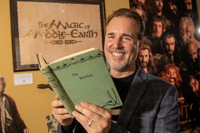 Curator Matt Fox with the first edition of The Hobbit on show at The Magic of Middle-Earth exhibition at  Experience Barnsley Museum & Discovery Centre, Town Hall in Barnsley photographed for the Yorkshire Post by Tony Johnson.