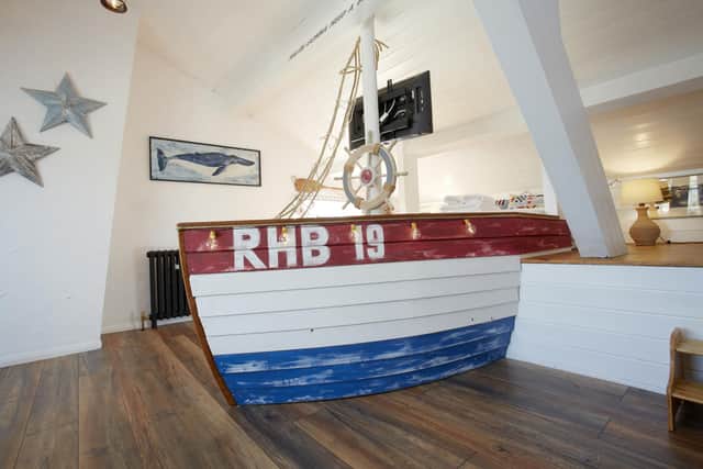 The main bedroom with its fabulous bespoke boat bed