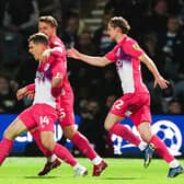 Huddersfield Town's Josh Ruffels (left) celebrates scoring their side's first goal of the game during the Sky Bet Championship match at Loftus Road, London. Picture: Zac Goodwin/PA Wire