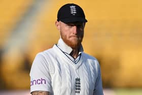 Putting a brave face on it. England captain Ben Stokes leave the field with his side already facing a mountain to climb almost as big as the overlooking Himalayas. Photo by Gareth Copley/Getty Images.