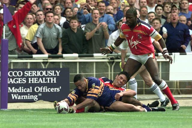 Leroy Rivett goes over to score watched by Martin Offiah. (Photo: YPN)